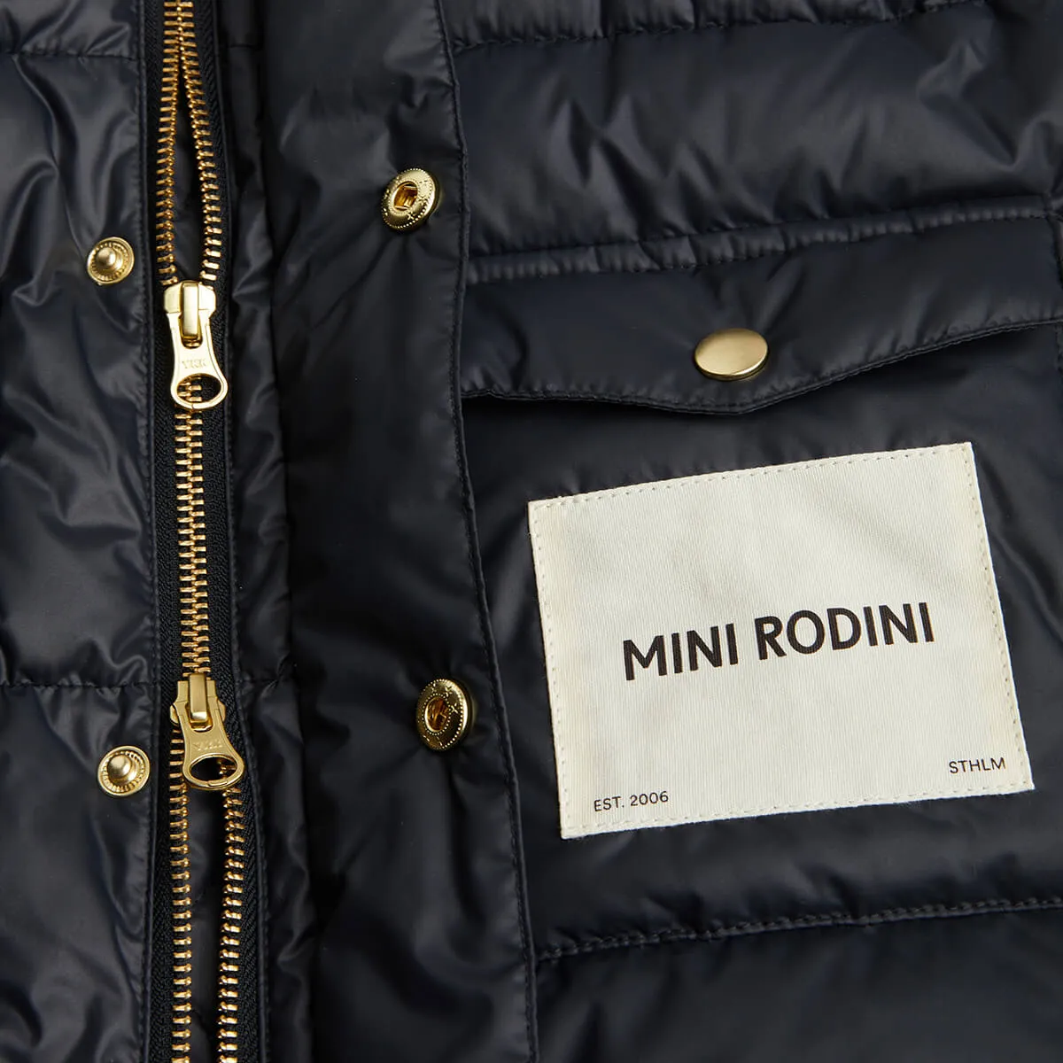 Heavy Hooded Puffer Jacket in Black by Mini Rodini